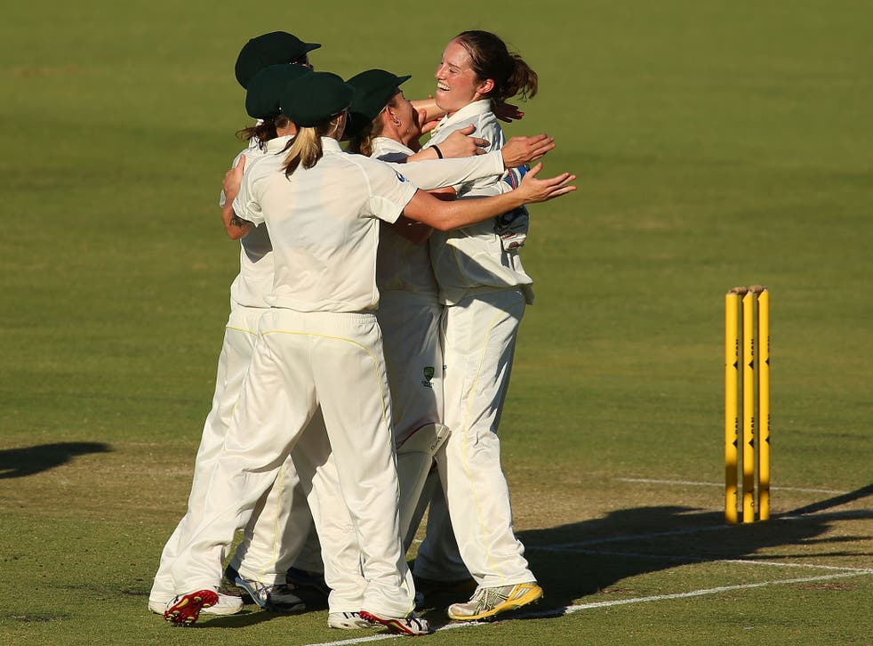 Rene Farrell celebrates with her Australia teammates after claiming the wicket of Sarah Taylor in the Women's Ashes Test