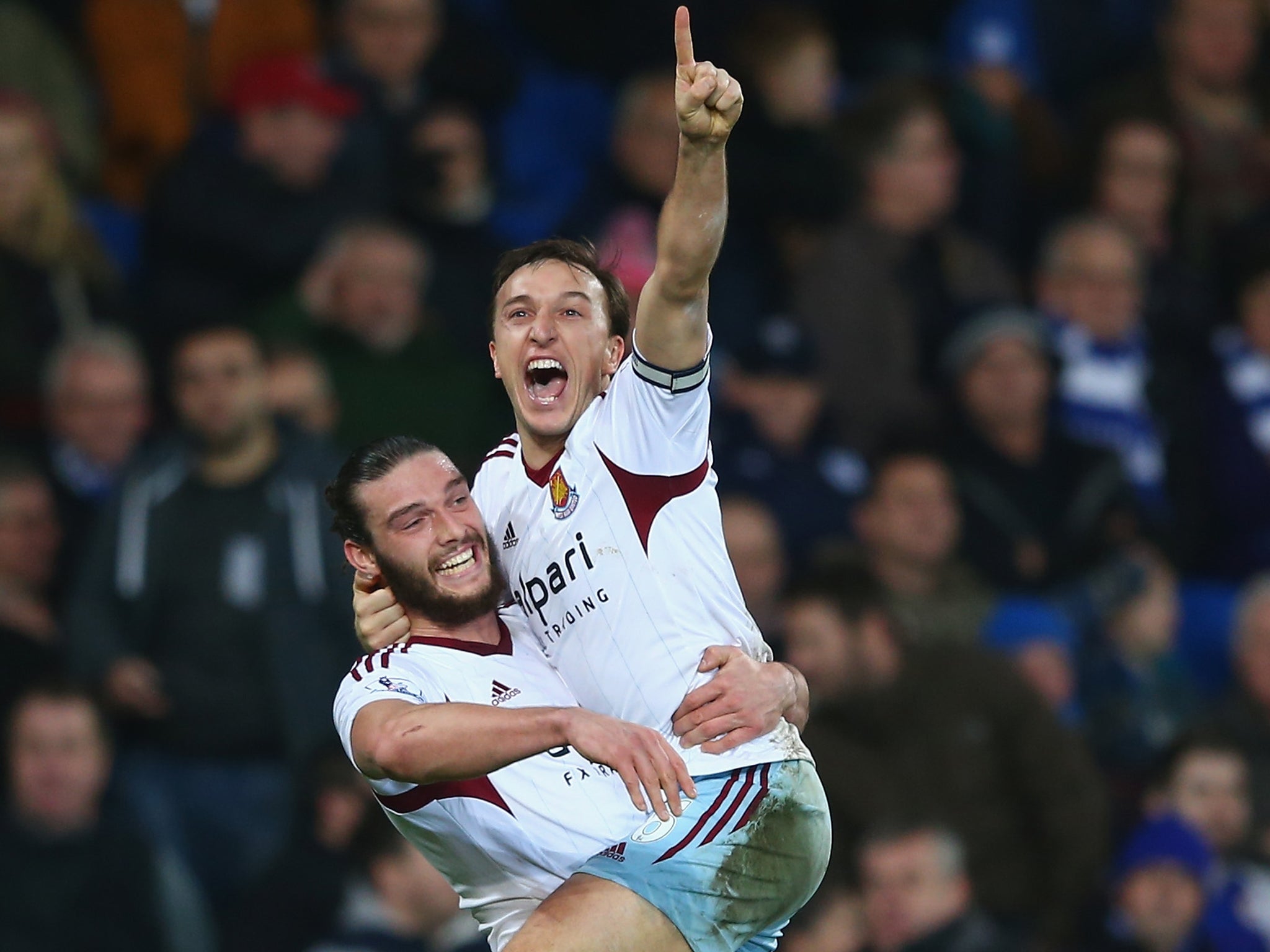 Andy Carroll and Mark Noble celebrate after the latter scores the second goal in the 2-0 win over Cardiff
