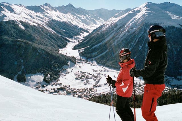 High society: Skiers looking down to the Swiss resort of Klosters