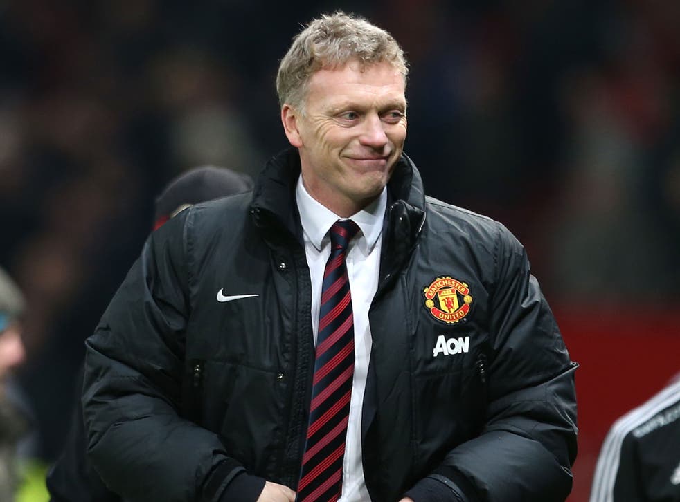 David Moyes smiles after Manchester United beat Swansea 2-0