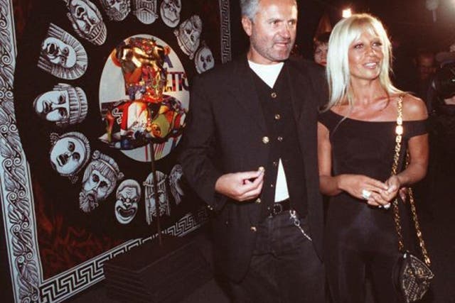 Gianni and Donatella Versace in 1992 during an exhibition of their work in New York Ron