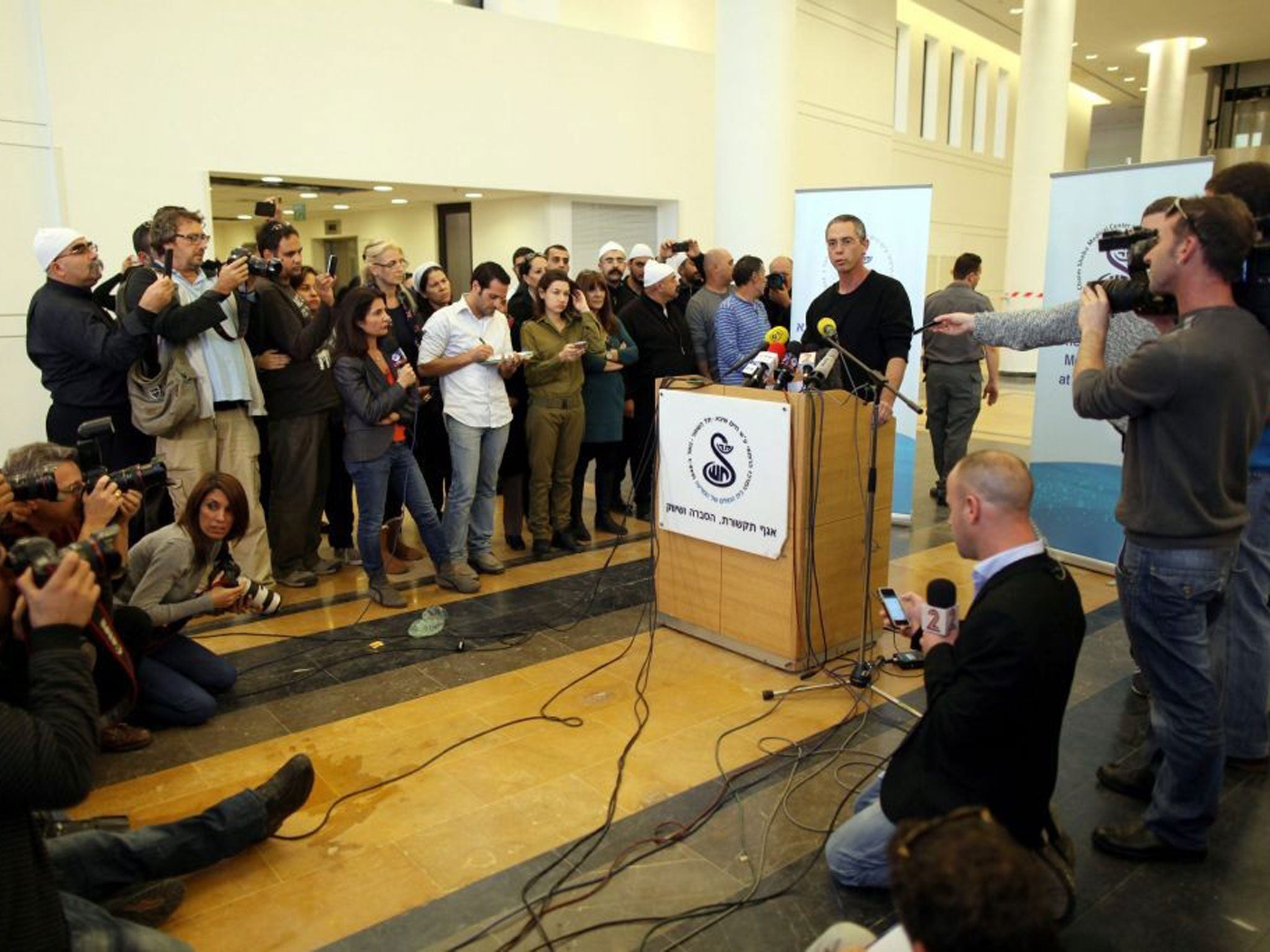 Gilad Sharon announcing the death of his father yesterday