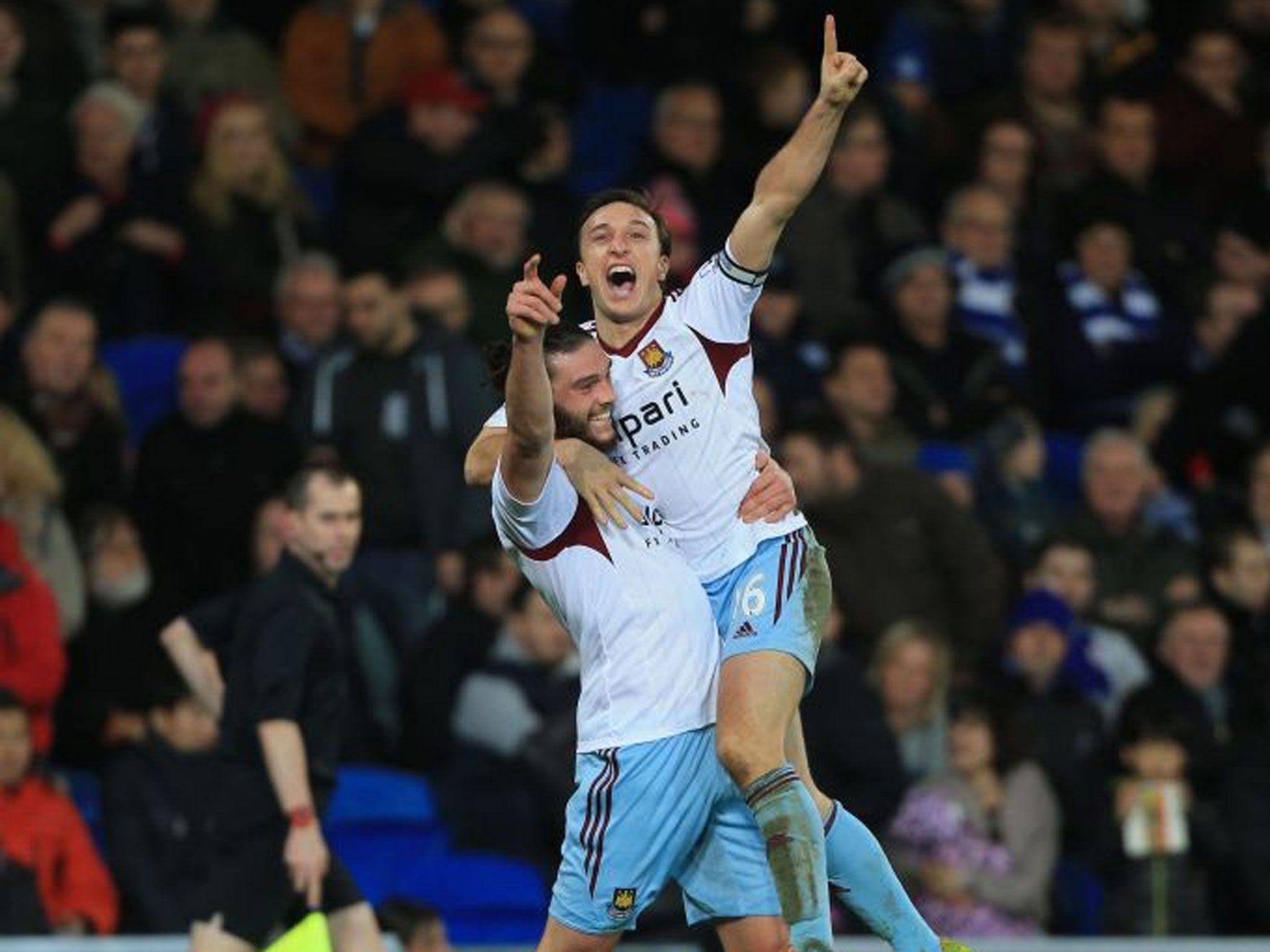 Noble prize: Mark Noble and Andy Carroll celebrate the second goal for West Ham