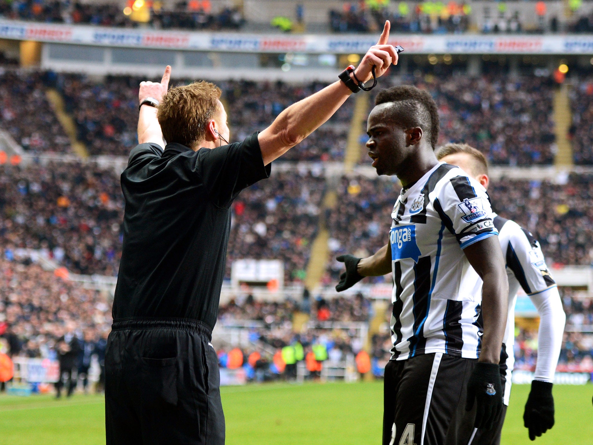 Cheik Ismael Tiote of Newcastle remonstrates with Referee Mike Jones after his goal is disallowed for offside