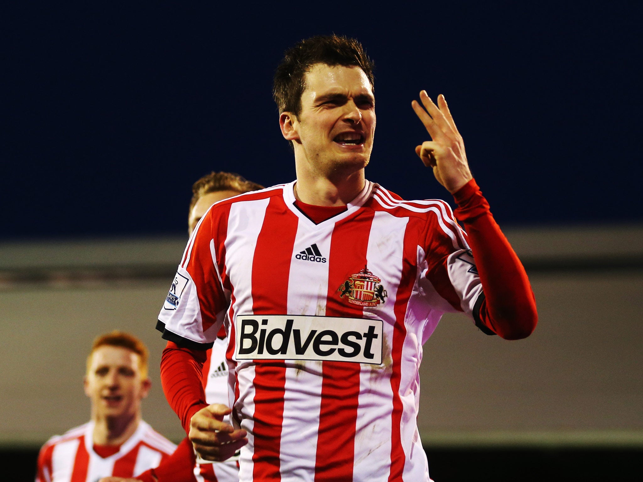 Adam Johnson celebrates his hat-trick against Fulham