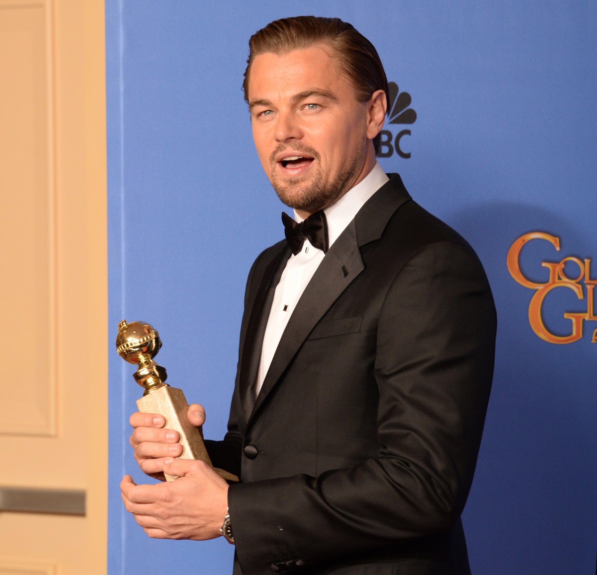 Leonardo DiCaprio with his Golden Globe for best actor in a comedy or musical