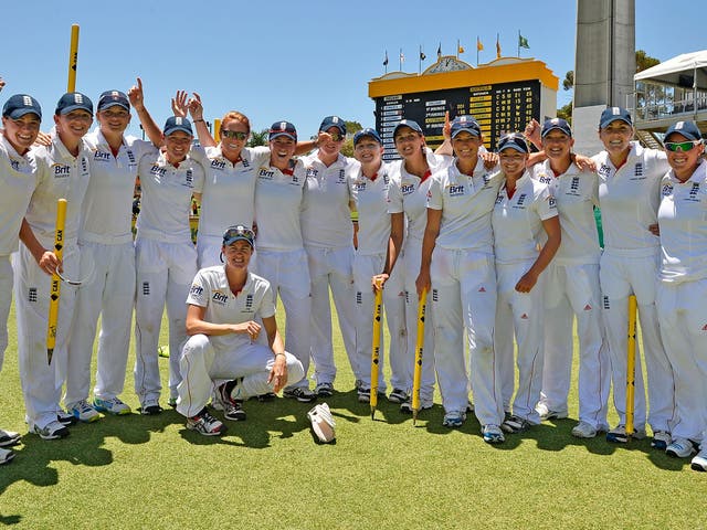 England women celebrate their victory in the Ashes Test match against Australia