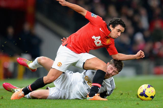 Manchester United defender Rafael has called for the players to stand up and take responsibility for the club's failing this season