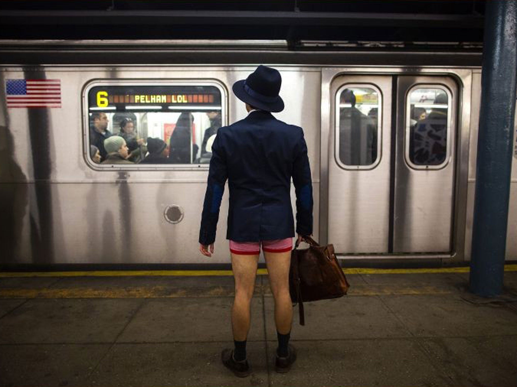 A man takes part in the annual No Pants Subway Ride in New York 12 January 2014