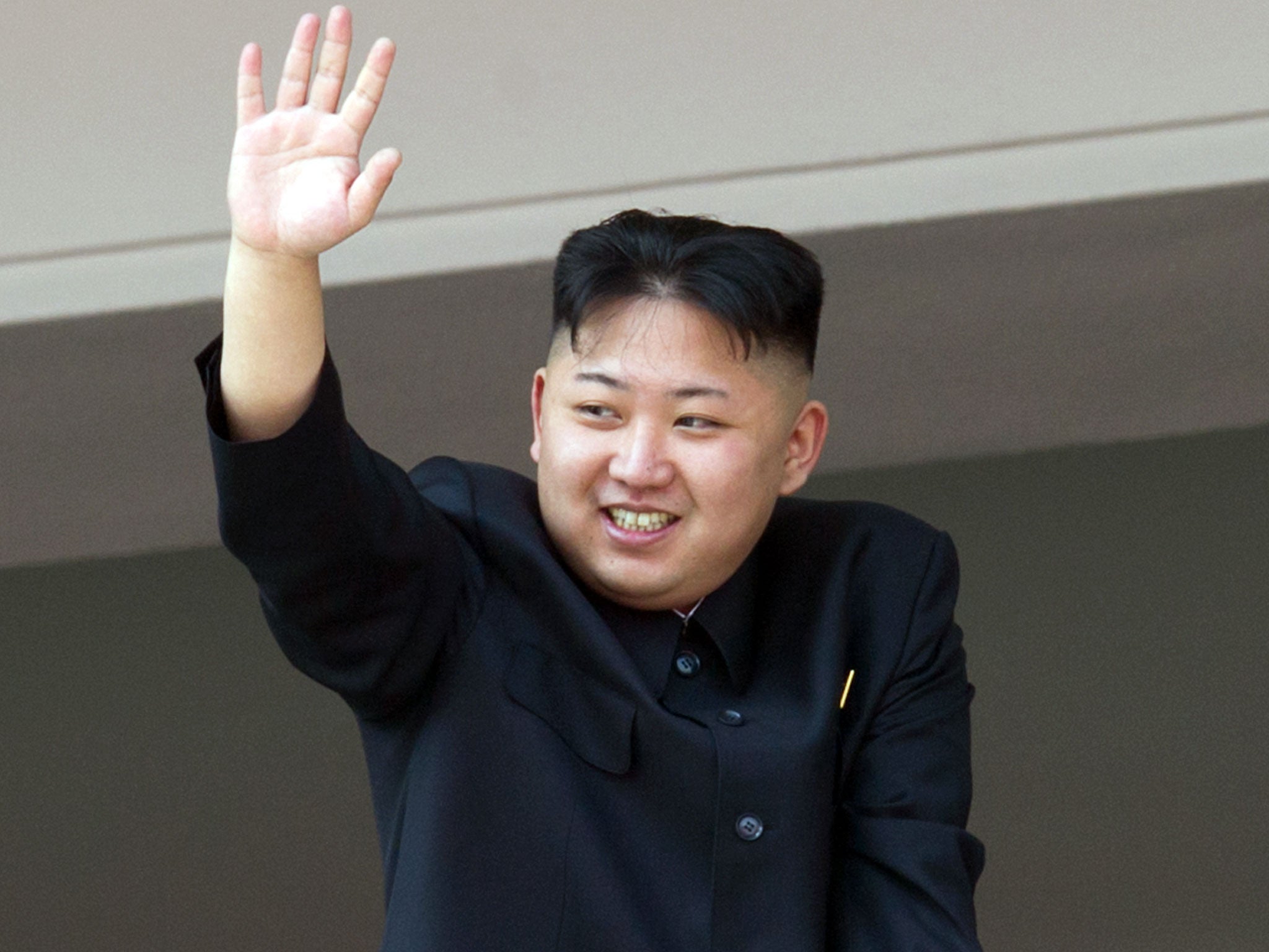 North Korean leader Kim Jong-Un waves after watching a military parade in honour of the 100th birthday of the late North Korean leader Kim Il-Sung in Pyongyang on April 15, 2012. North North Korean leader Kim Jong-Un delivered his first ever public speech