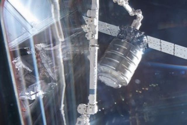 The Cygnus cargo ship is seen docking with the iSS this weekend.
