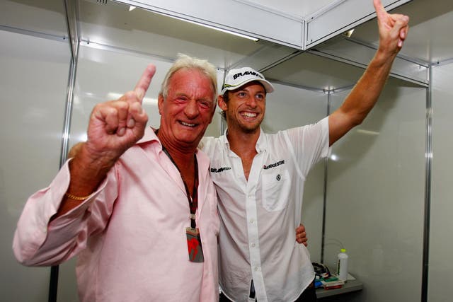 John Button celebrates with his son Jenson after he claimed the 2009 Formula 1 drivers' world championship
