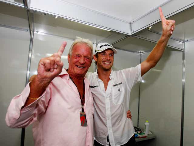 John Button celebrates with his son Jenson after he claimed the 2009 Formula 1 drivers' world championship