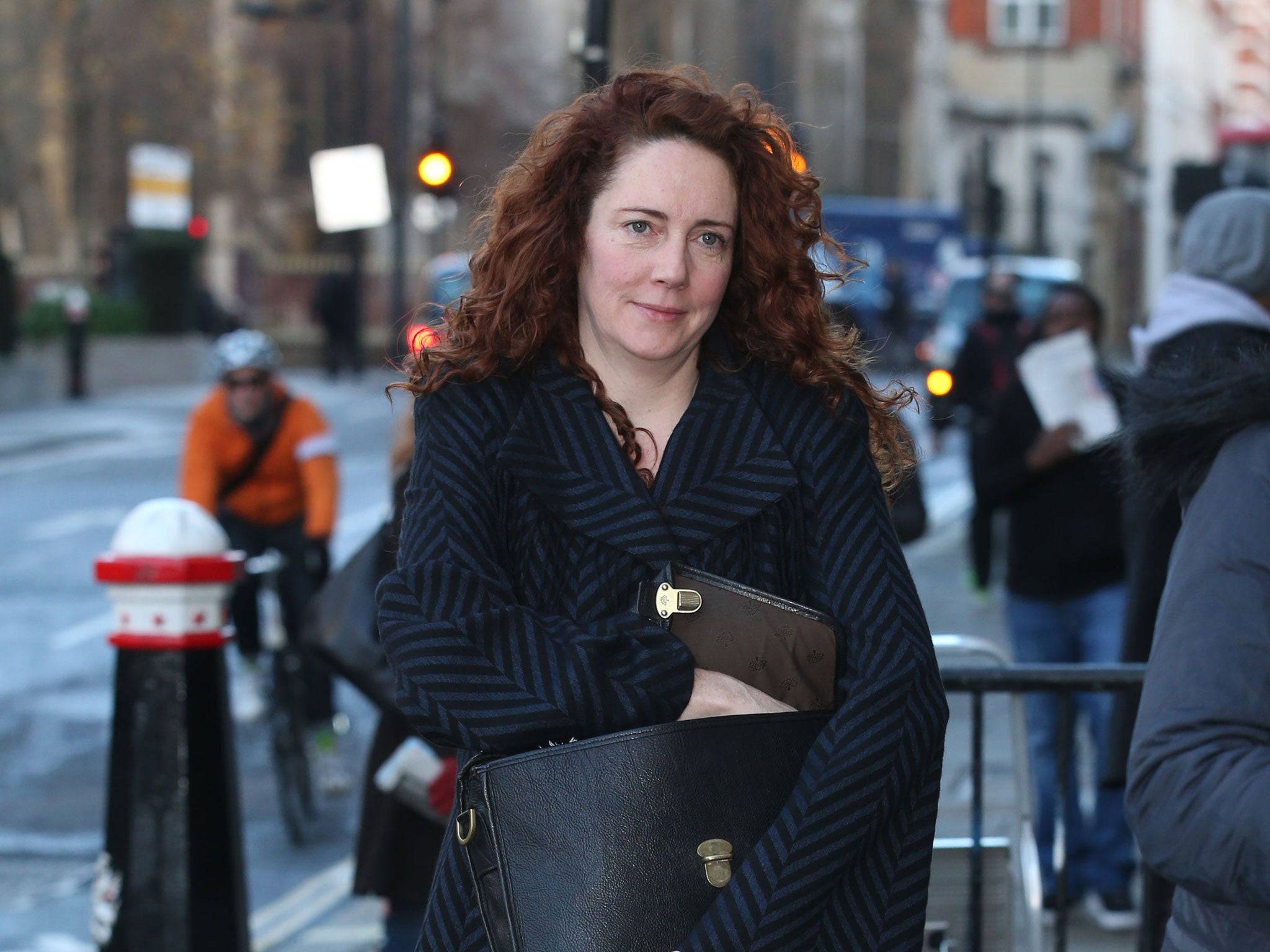 CCTV footage of Rebekah Brooks' husband allegedly hiding evidence from the police was shown to the jury