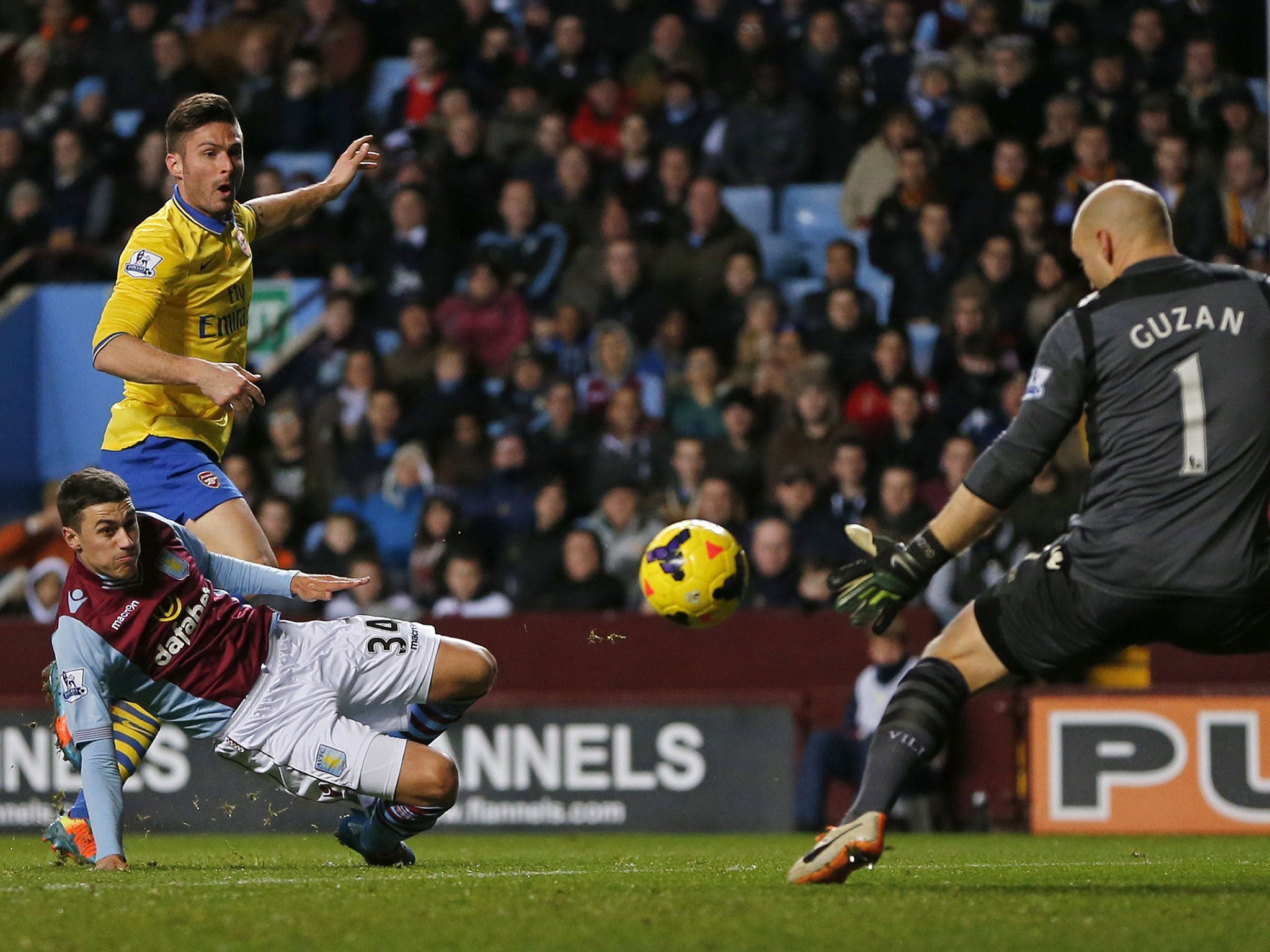 Olivier Giroud scores Arsenal's second goal at Villa Park