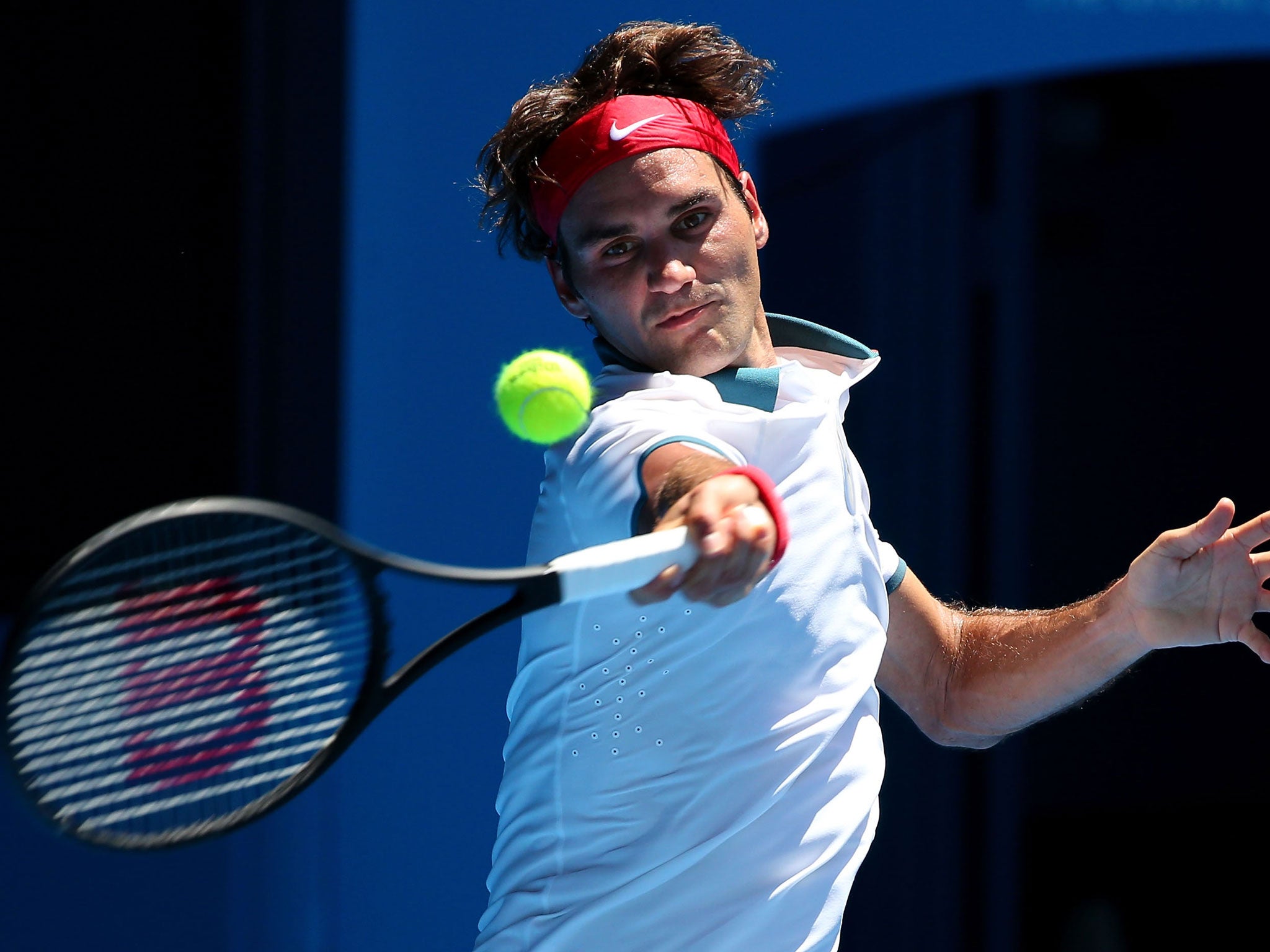 Roger Federer eased into the second round of the Australian Open via a 6-4 6-4 6-2 victory over Australian wildcard James Duckworth