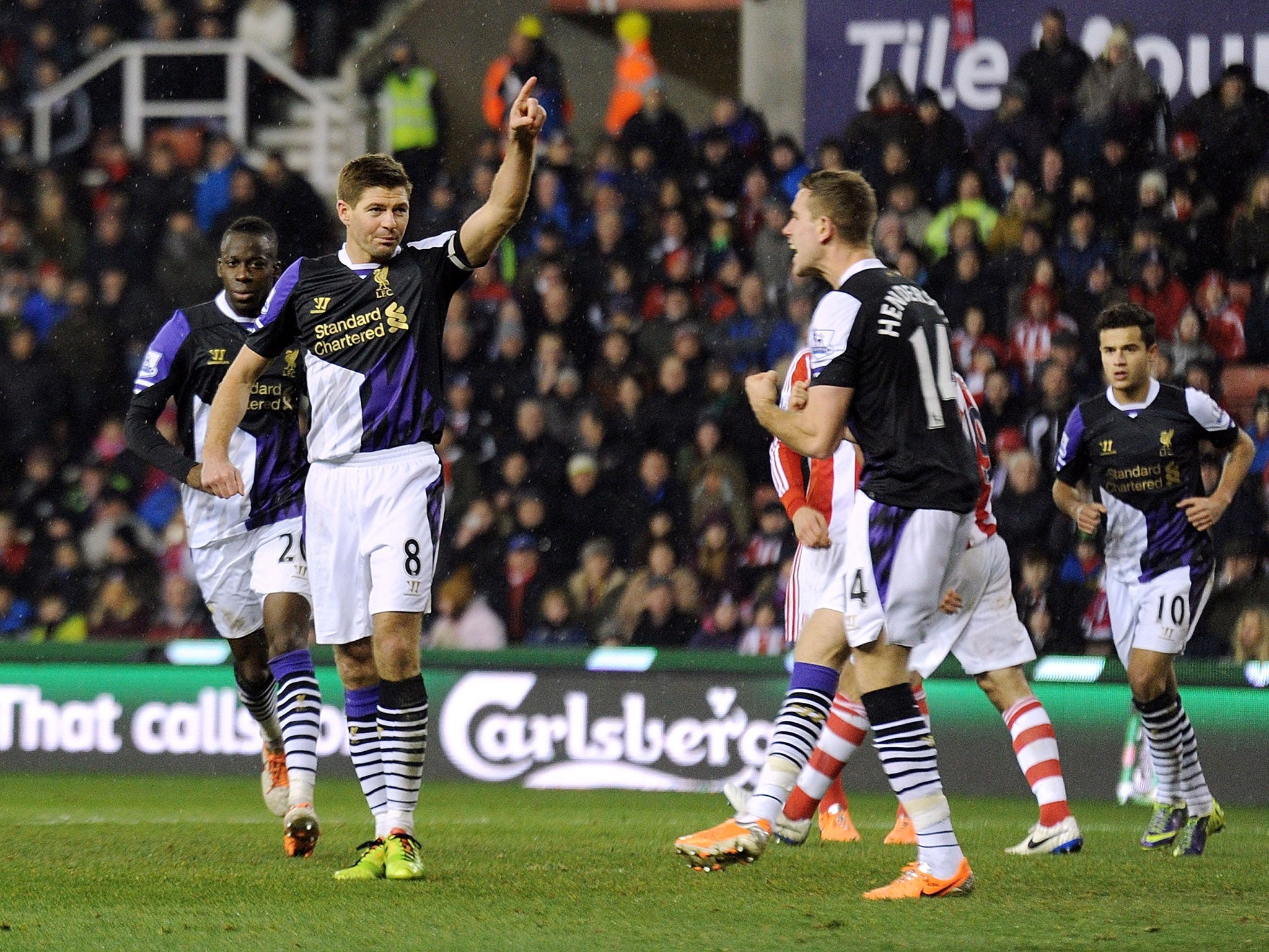 Steven Gerrard celebrates after scoring in Liverpool's 5-3 victory over Stoke