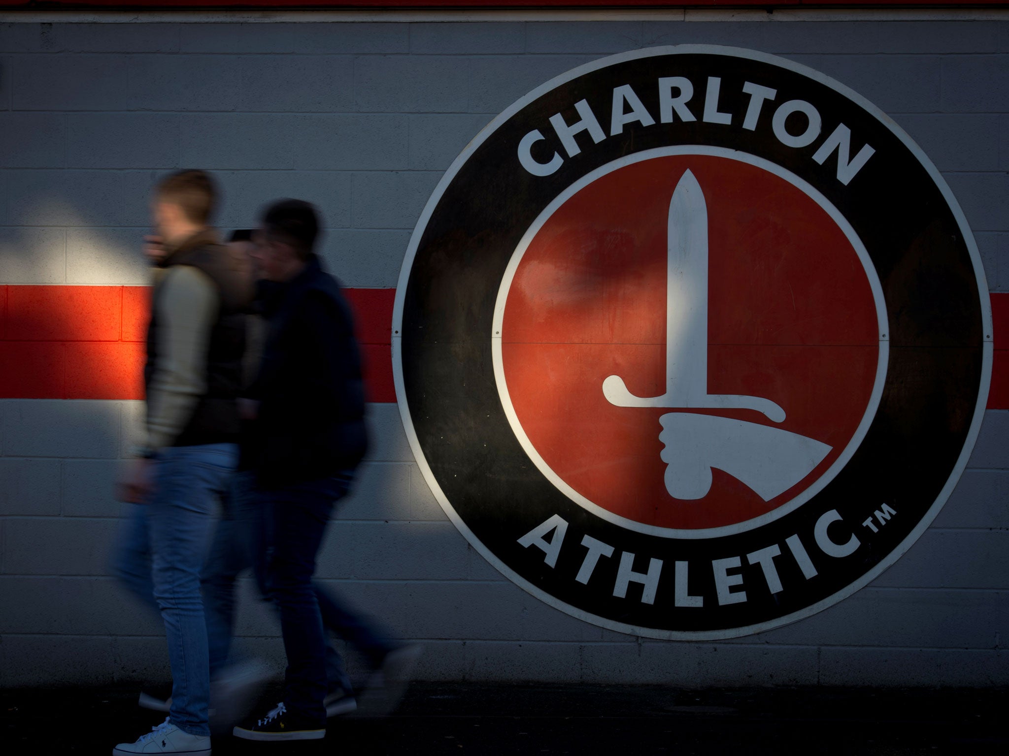 Fans arrive at Charlton Athletic's home ground The Valley