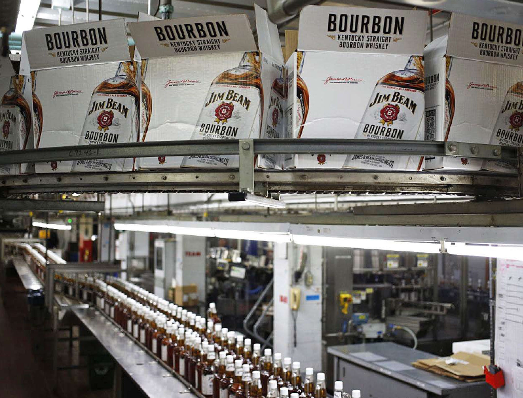 Bottles of Jim Beam Bourbon make their way down a conveyor belt inside the bottling plant at the Jim Beam Bourbon Distillery