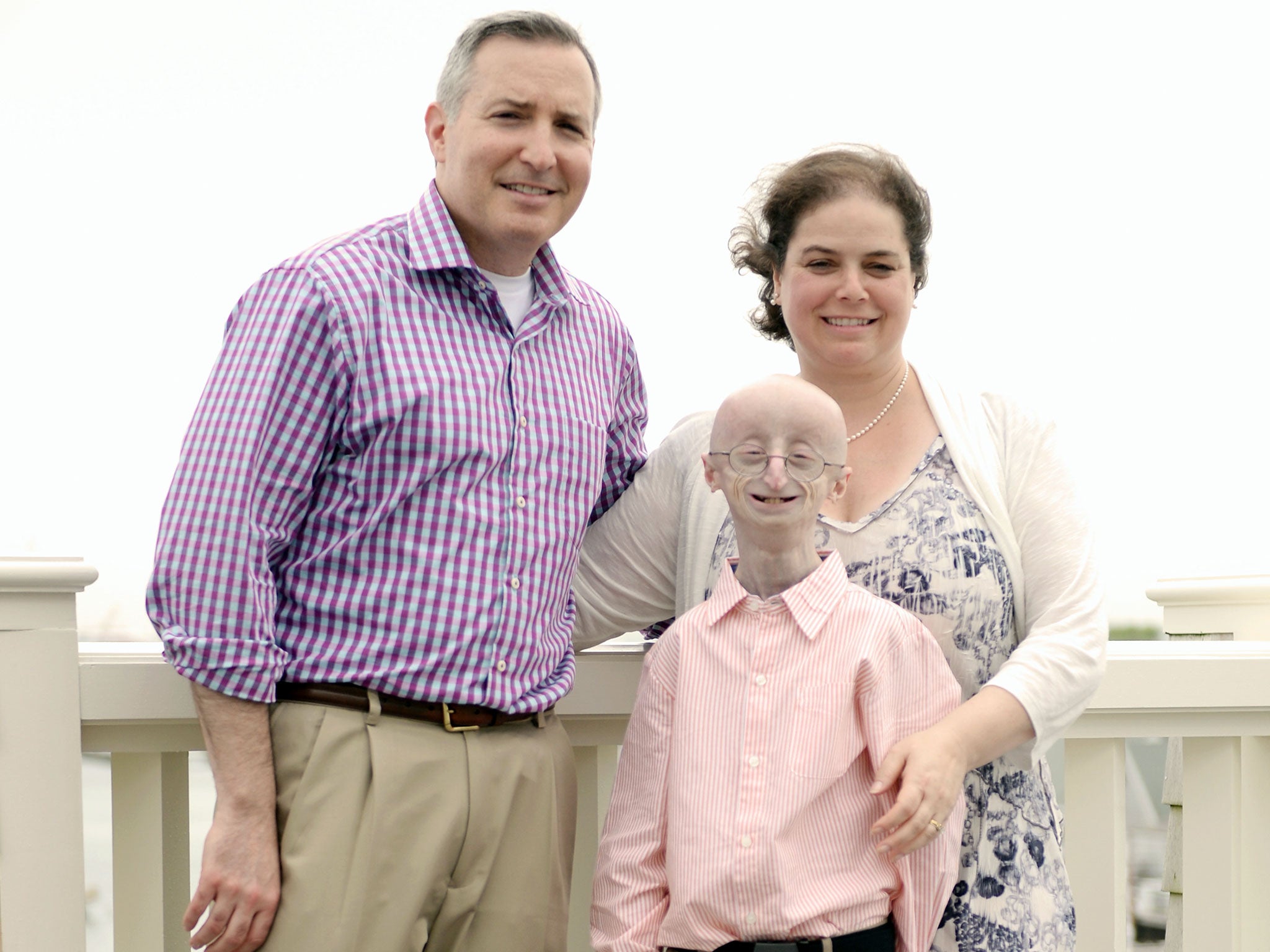 The late Sam Berns (centre) with his parents Scott Berns and Leslie Gordon at the 18th Annual Nantucket Film Festival in June 2013.