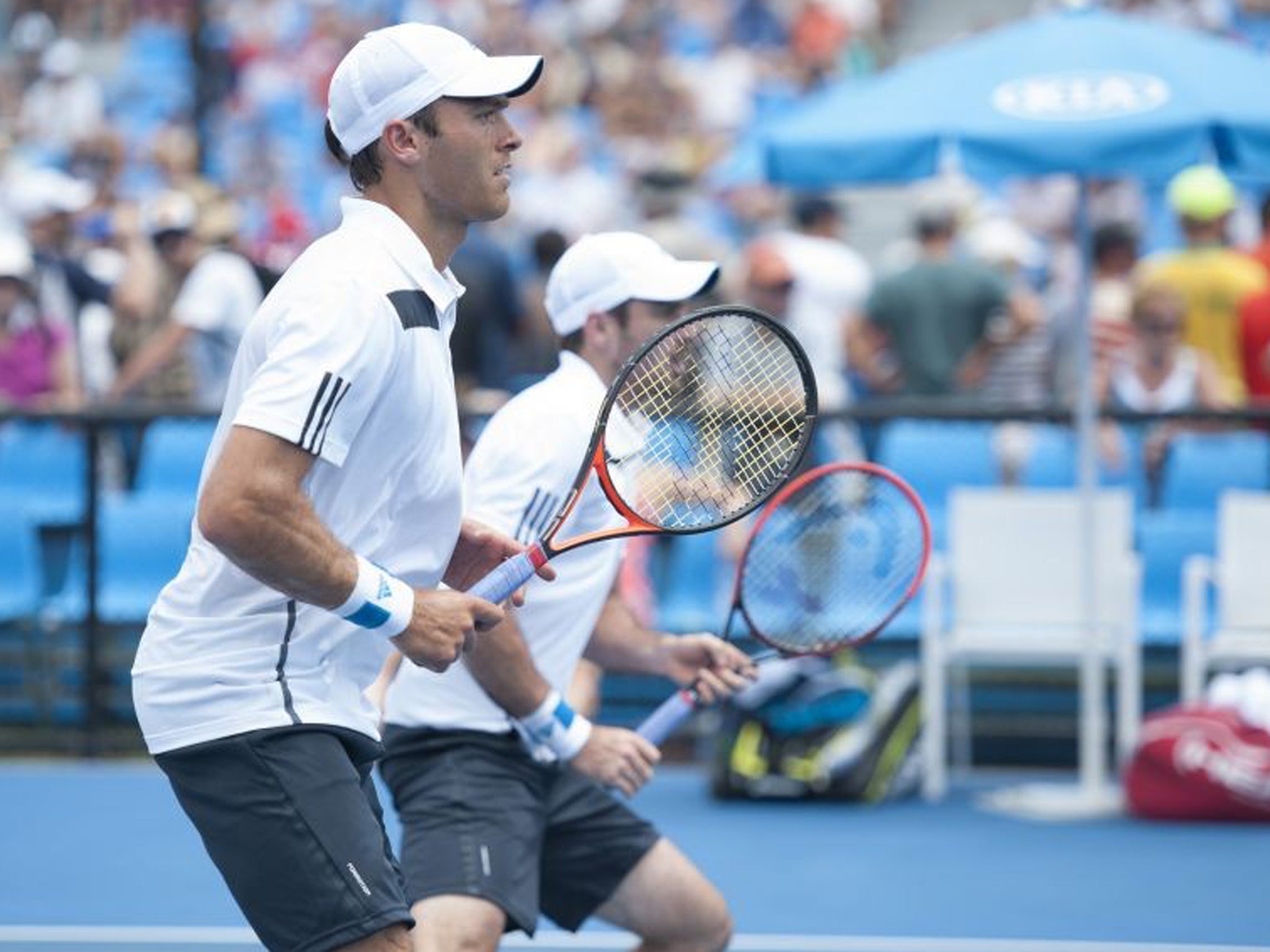 Ross Hutchins, left, with his Scottish partner Colin Fleming, in the first round of the men's doubles at the Australian Open