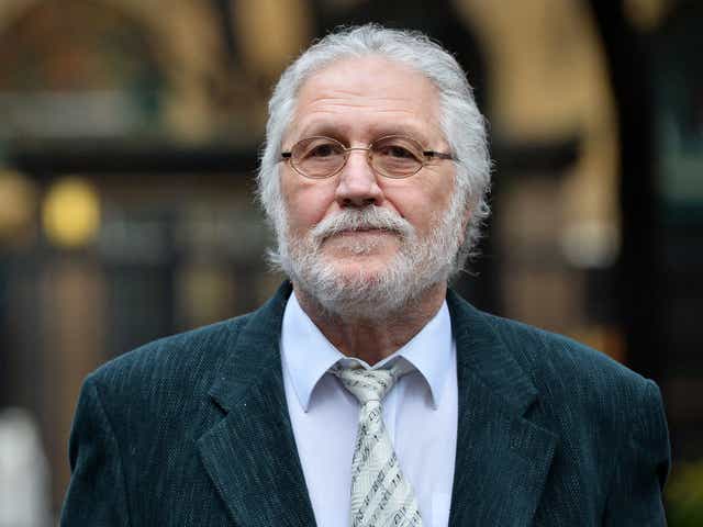 Dave Lee Travis arrives at Southwark Crown Court in London on Wednesday for the second day of his trial.