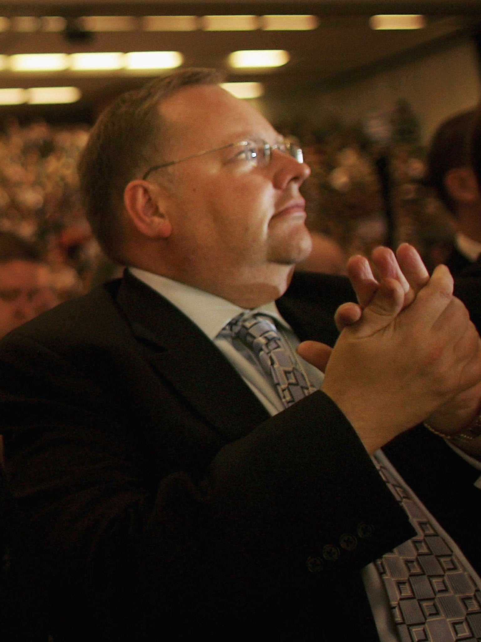 Lord Rennard applauds former leader of the Liberal Democrats, Charles Kennedy during his speech to delegates in 2006.