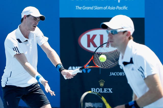 Jamie Murray (L) suffered from heat stroke following his victory with doubles partner John Peers (R) over Matt Reid and Luke Saville at the Australian Open