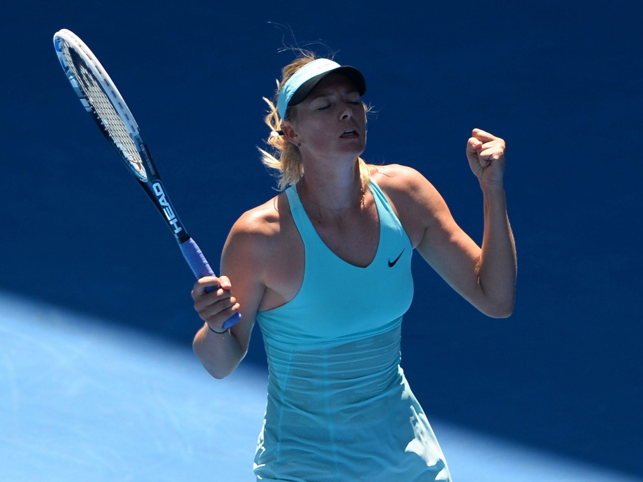 Maria Sharapova celebrates her victory over Karin Knapp in the Australian Open second round
