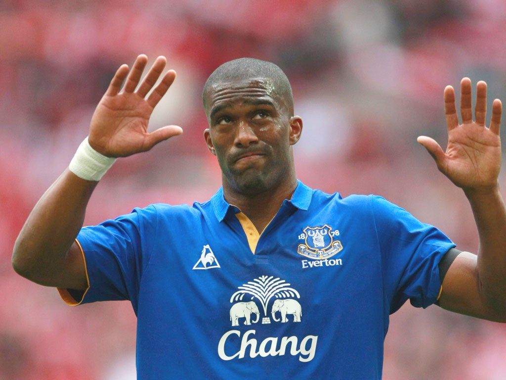 Sylvain Distin holds his hands up