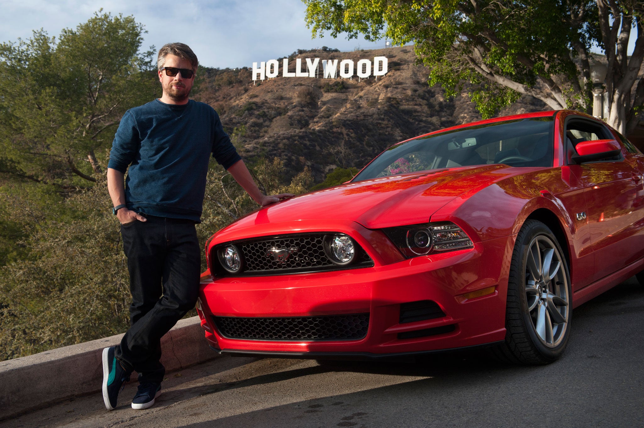 Tim Walker with his Mustang beneath the Hollyood sign and driving through the Los Angeles River