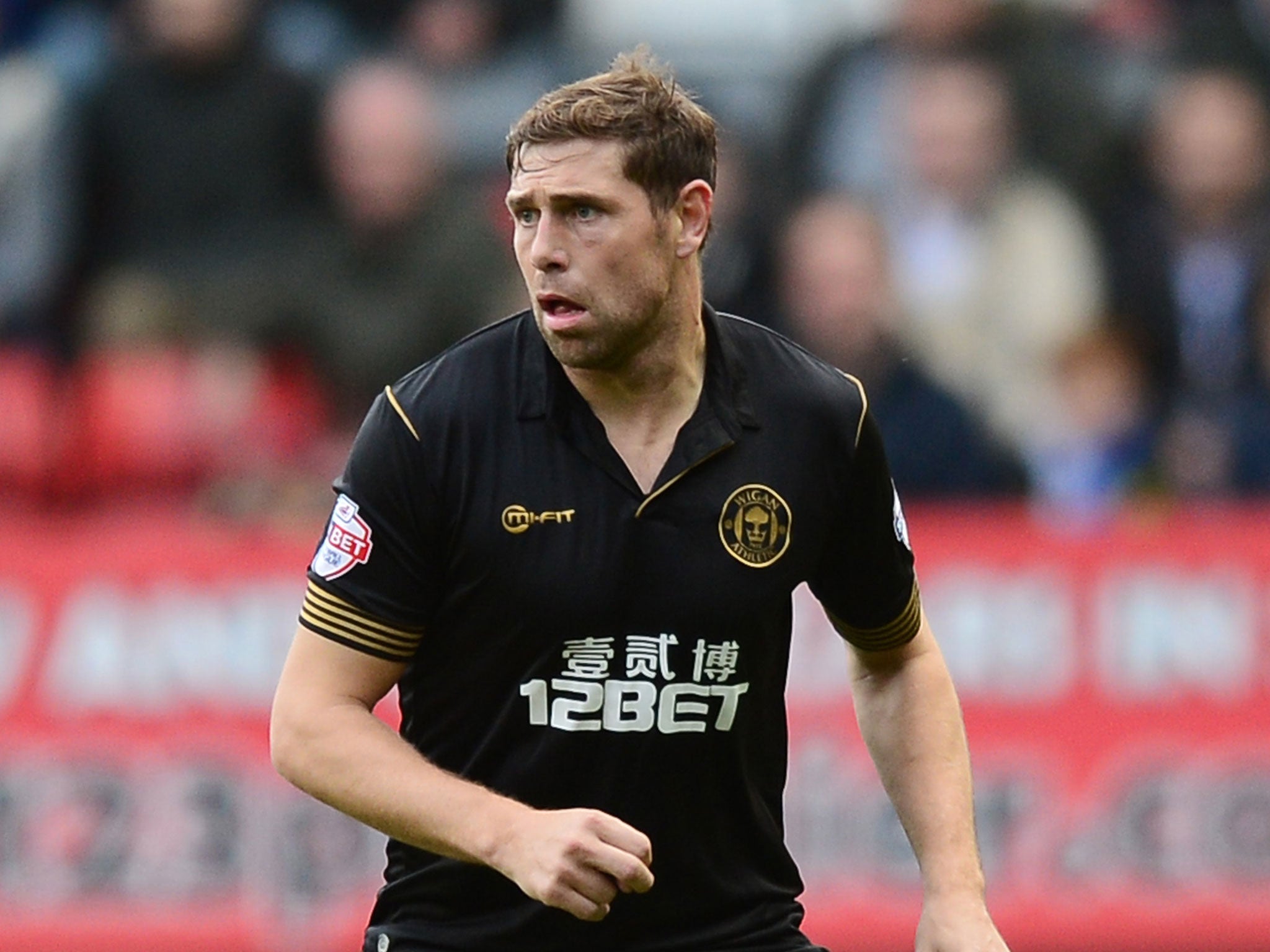 Former footballer Grant Holt is to try his hand at wrestling (Getty)