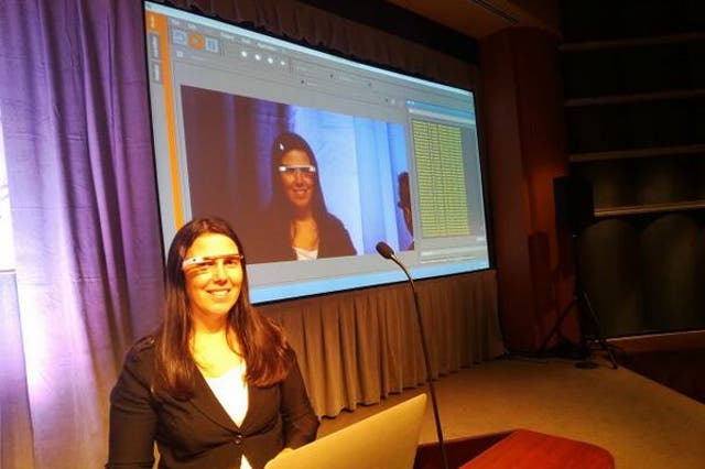 Cecilia Abadie wears Google Glass during a conference