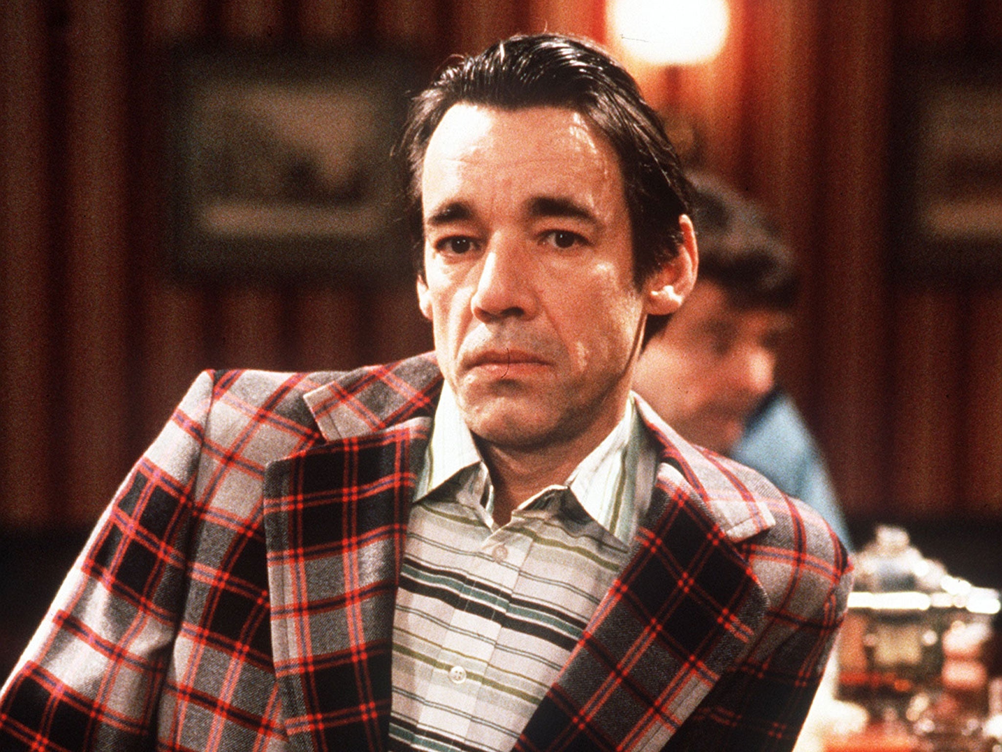 Lloyd-Pack as Trigger in 'Only Fools and Horses'; he described the role as 'a blessing and a curse'