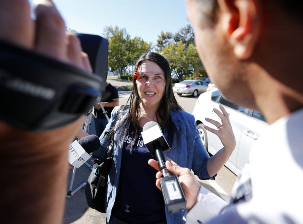 Defendant Cecilia Abadie speaks to the media as she arrives at a traffic court in San Diego January 16, 2014.