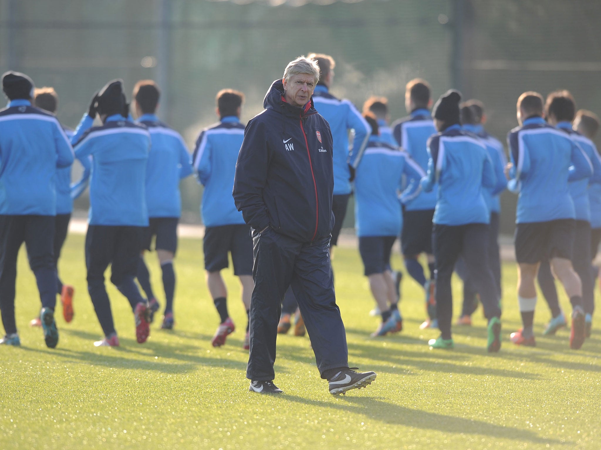 Arsene Wenger pictured taking an Arsenal training session