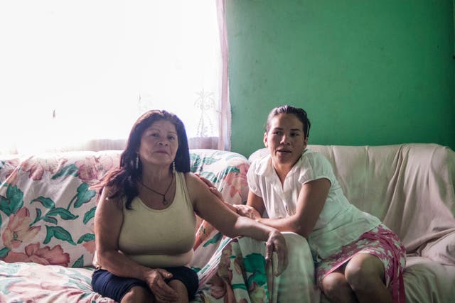 Josefina Flores, left, with her daughter Xiomara. Xiomara, now 32, was taken from Josefina when bshe was just one-anda- half, in 1984. They did not see each other again until 2 December 2013