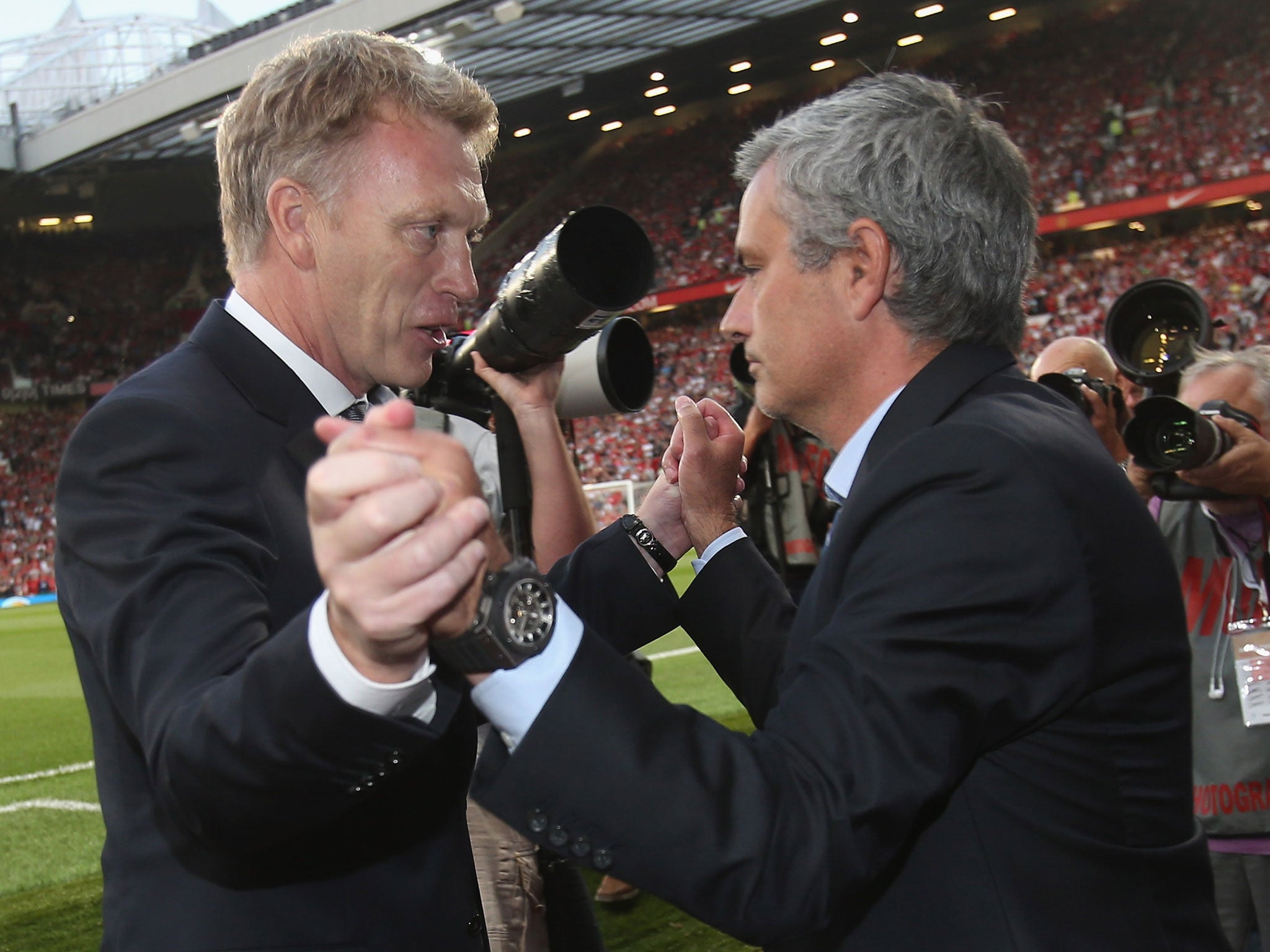 David Moyes and Jose Mourinho shake hands ahead of the goalless draw between Manchester United and Chelsea at Old Trafford in August 2013