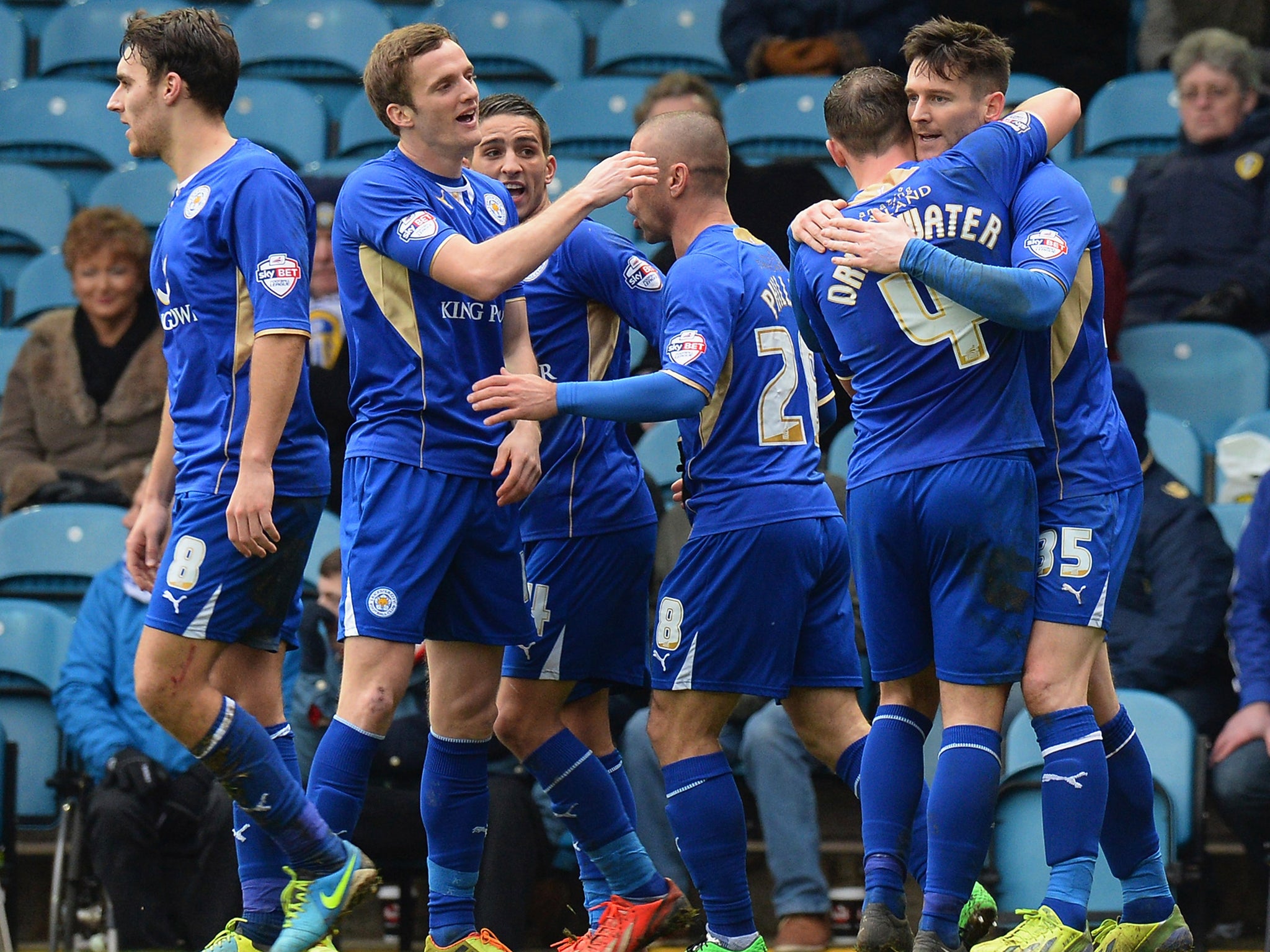Leicester celebrate after David Nugent scores to give them a late win over Leeds