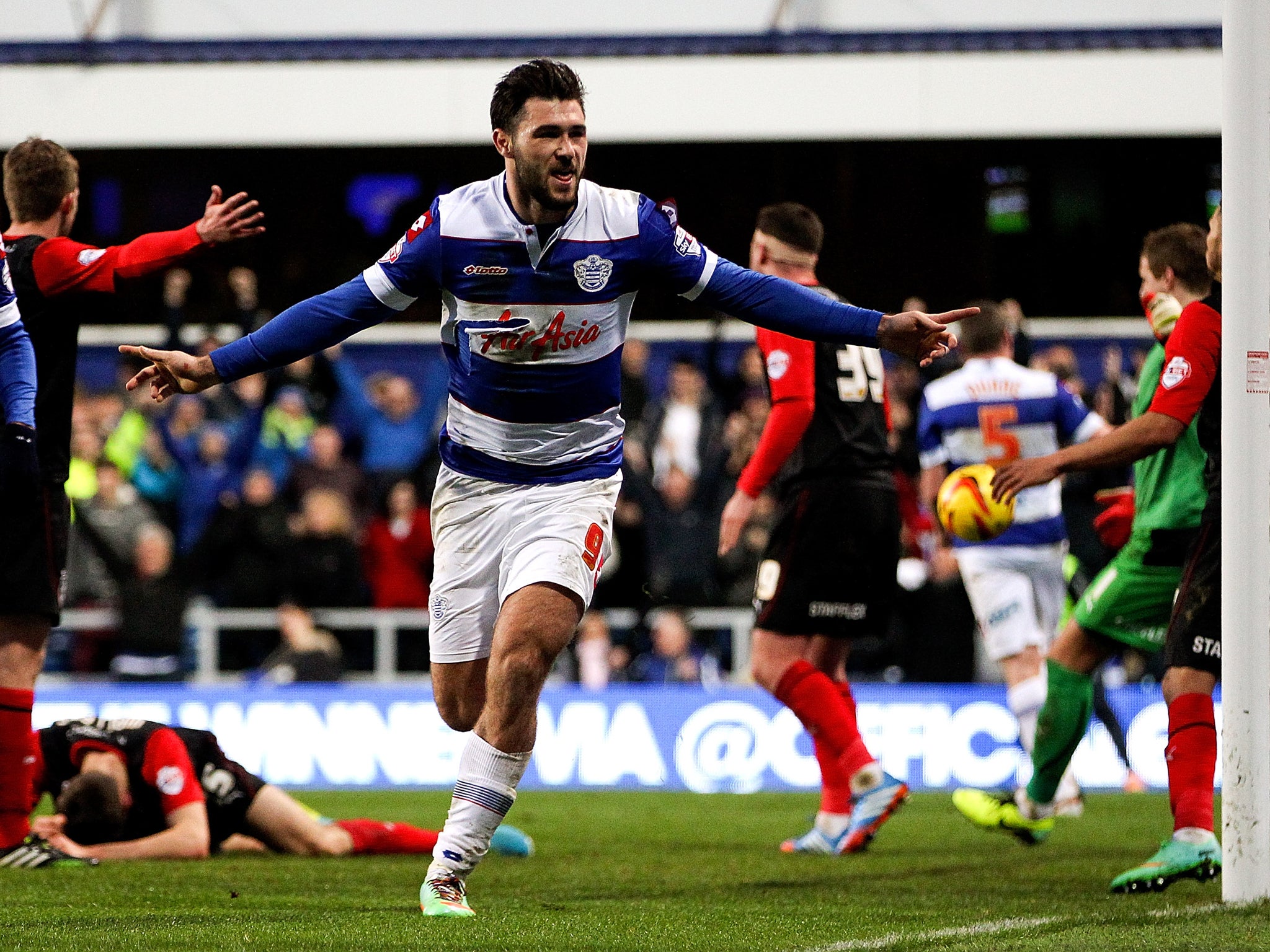 Charlie Austin scored twice to give QPR a 2-1 win over Huddersfield