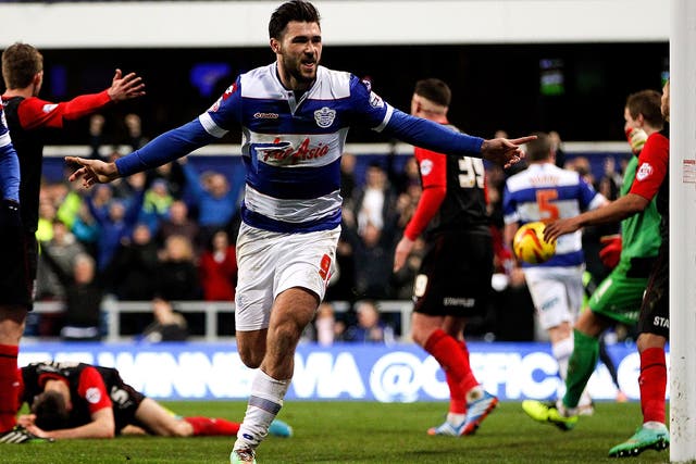Charlie Austin scored twice to give QPR a 2-1 win over Huddersfield