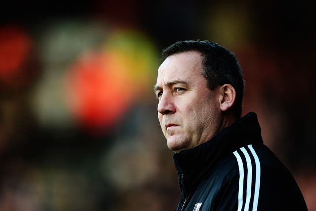 Rene Meulensteen looks on during his Fulham side's 2-0 defeat to Arsenal