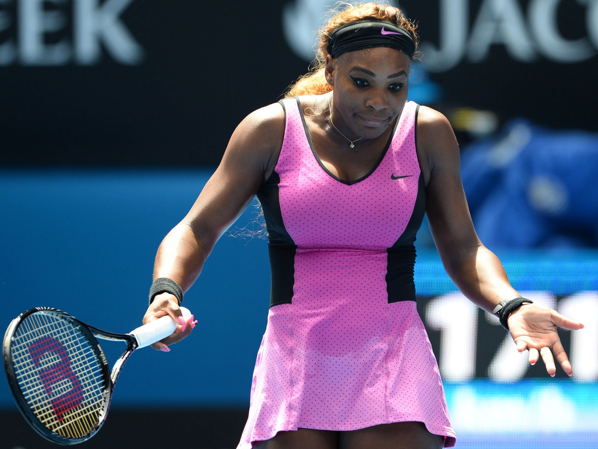 Serena Williams reacts during her defeat by Ana Ivanovic at the Australia Open on Sunday