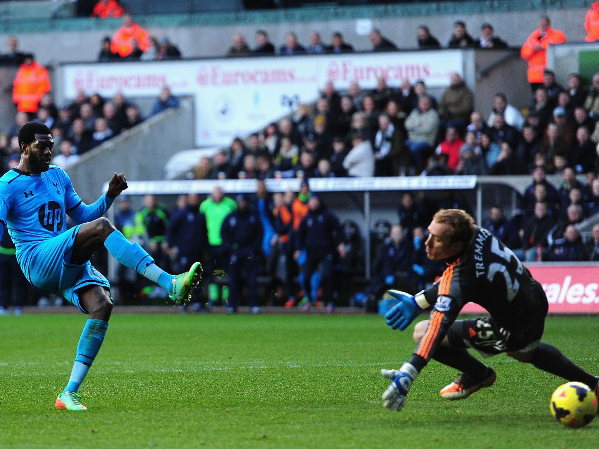 Emmanuel Adebayor scores his second of the match