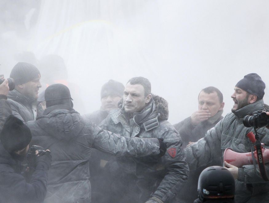 Opposition leader Vitali Klitschko was sprayed with a fire extinguisher after he tried to calm protesters