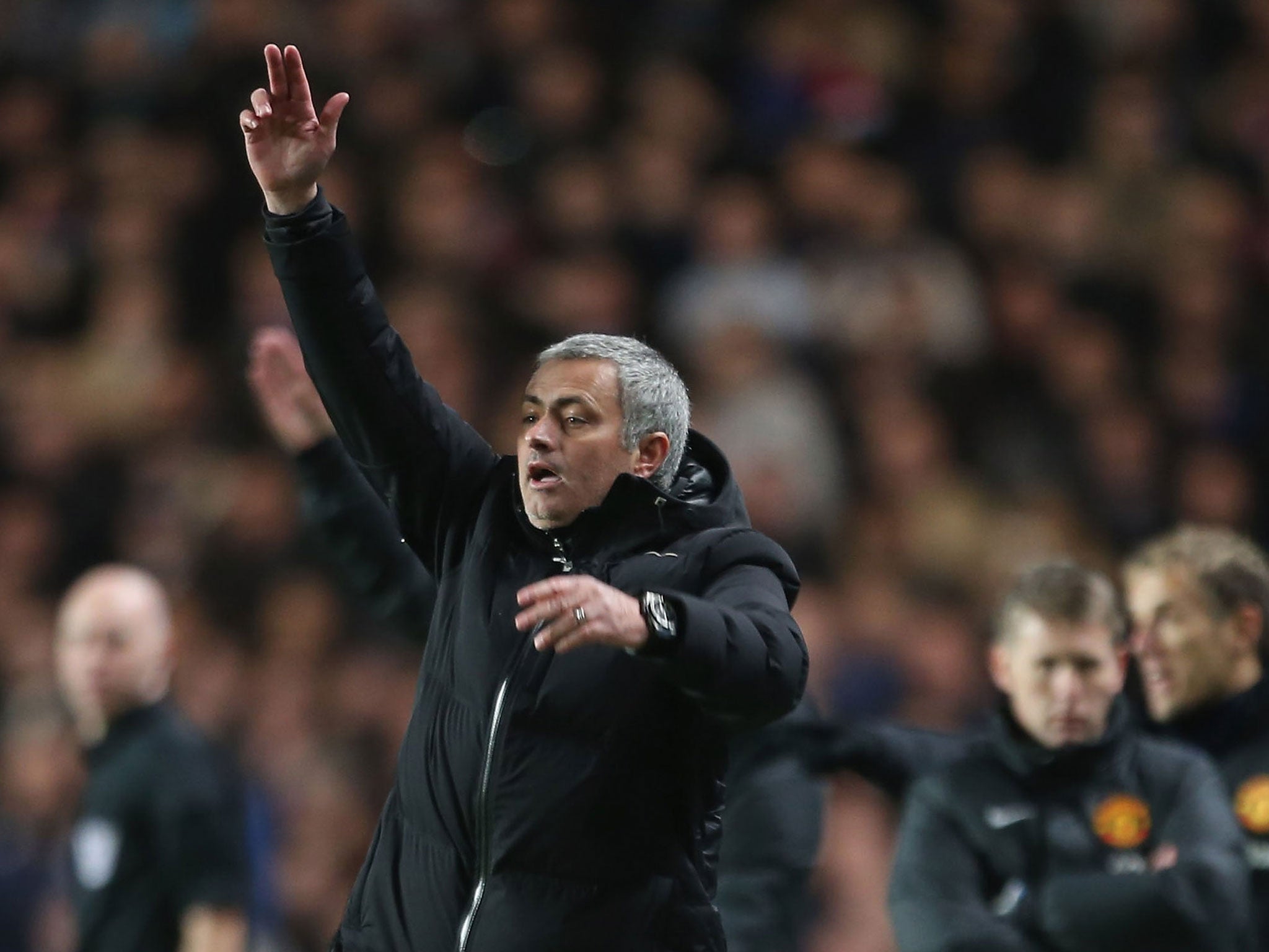 Jose Mourinho makes a gesture from the touchline during Chelsea's 3-1 win over Manchester United on Sunday