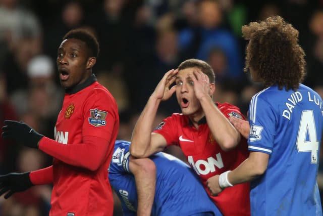 Nemanja Vidic can't believe his red card in the 3-0 defeat to Chelsea