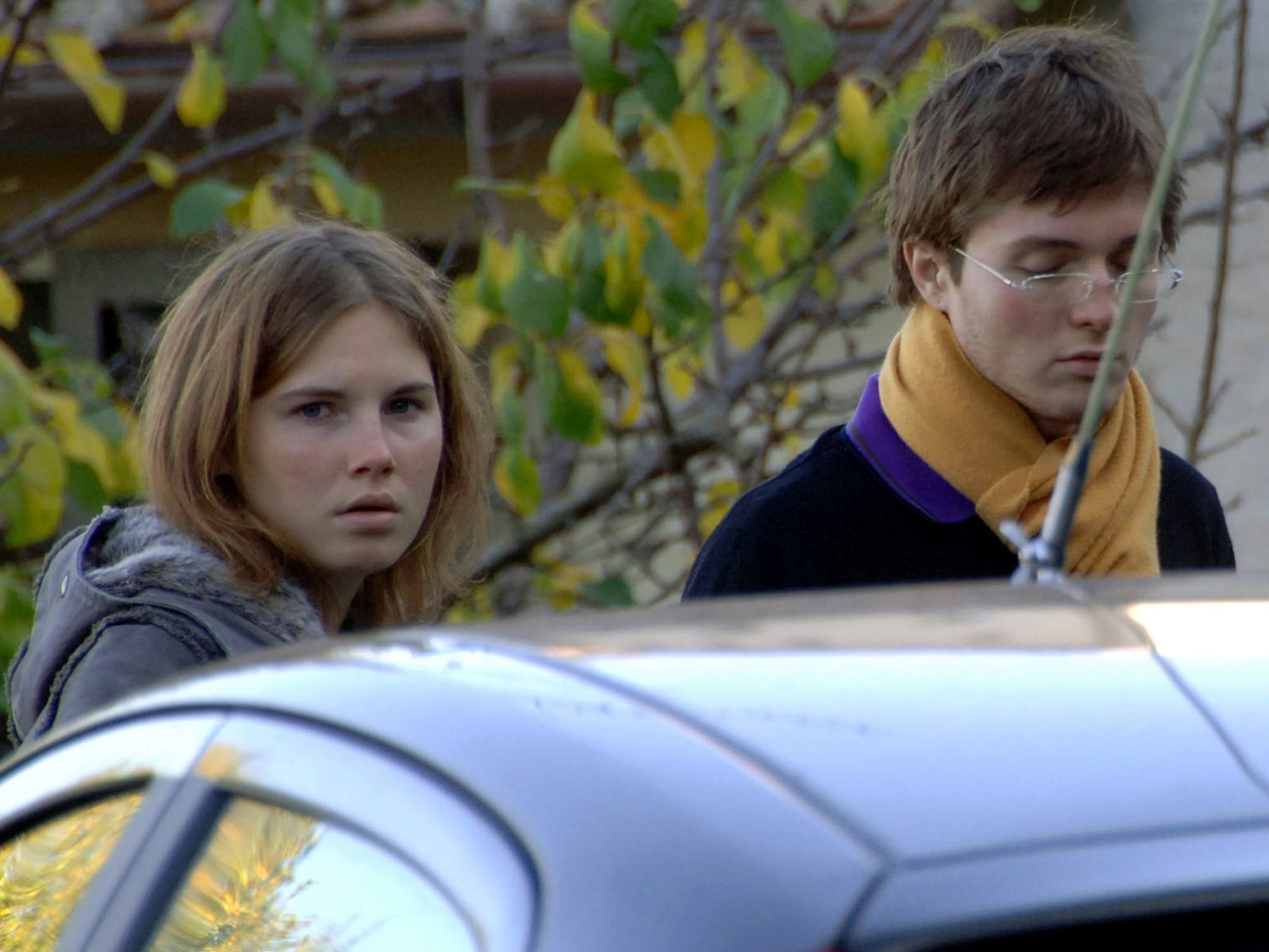 Amanda Knox, left, and Raffaele Sollecito in 2007, outside the rented house where 21-year-old British student Meredith Kercher. Defense lawyers for Amanda Knox and her Italian former boyfriend have their final say in the case on 20 January