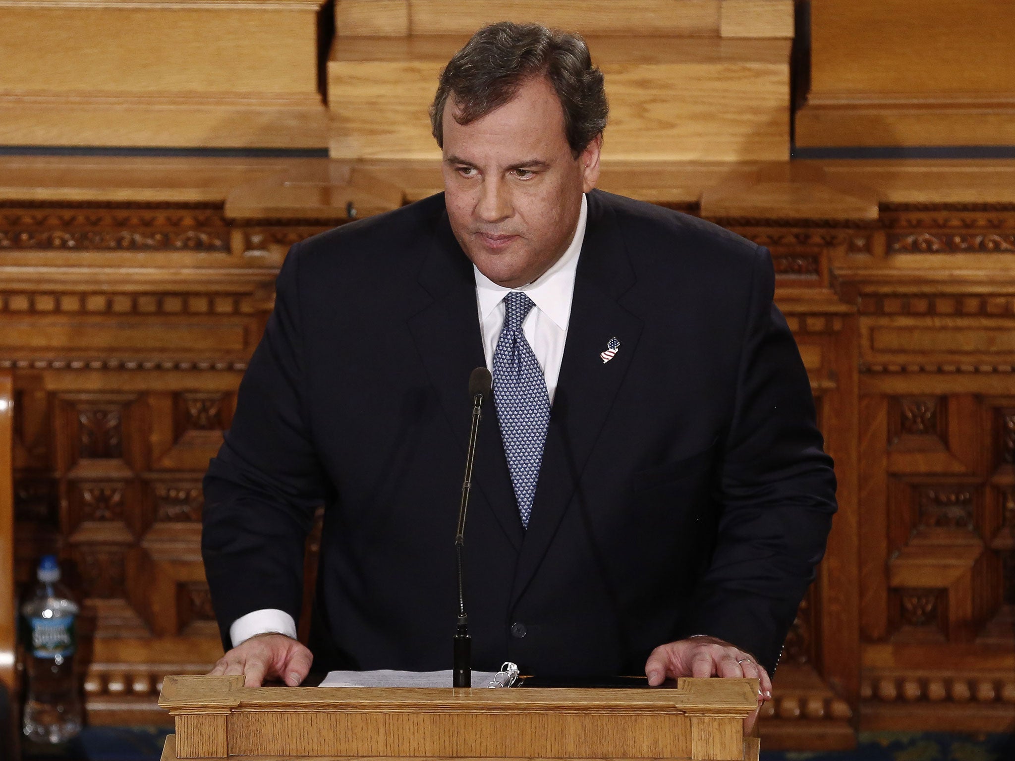 Carl Lewis has accused Chris Christie of intimidation