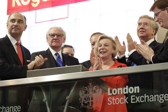 Moya Greene in red at the London Stock Exchange in October 2013; Moya Greene's ?1.5m earnings were modest compared  to those of other FTSE 100 bosses